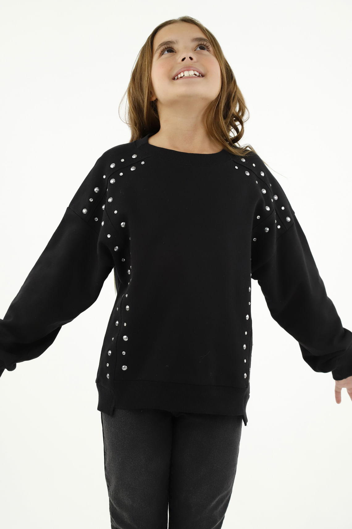 Buzo negro con apliques para niña