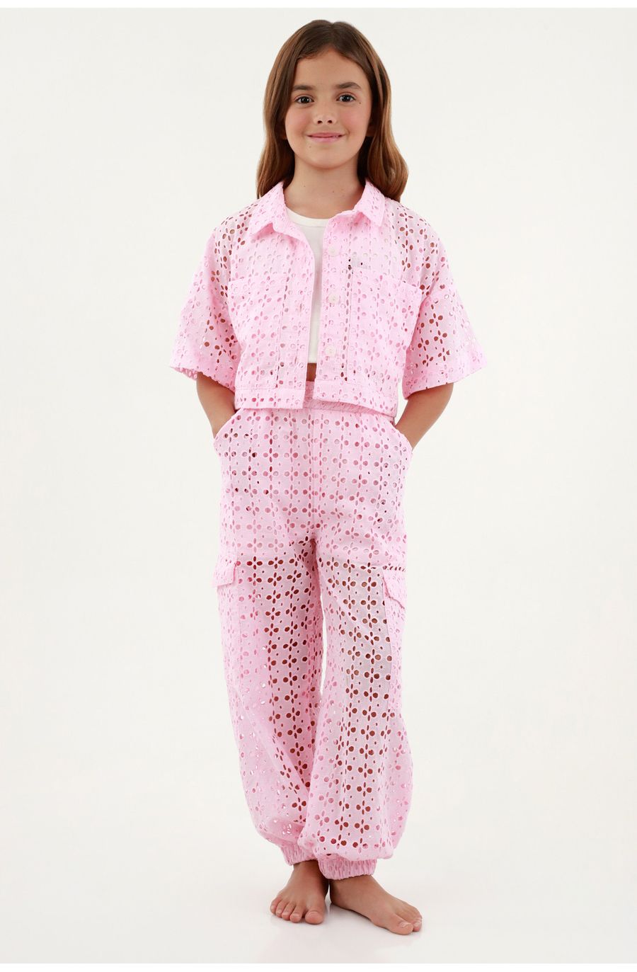 Pantalón rosado en ojalillo para niña