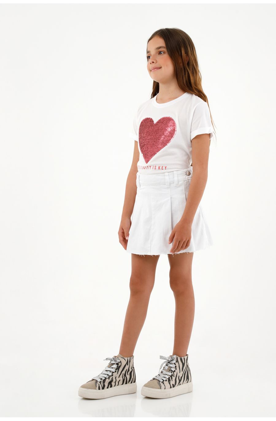 Falda crudo con tablas para niña