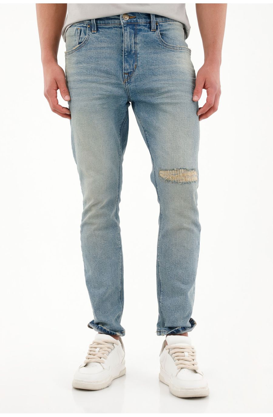 Jean Nudy de tiro medio con roto para hombre