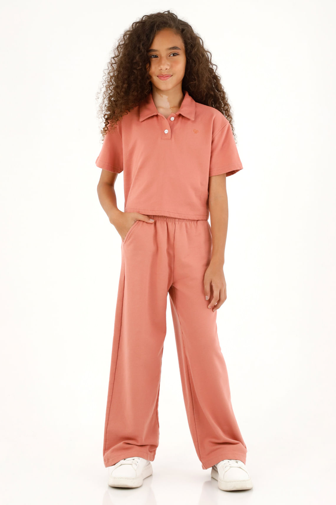 Camiseta tipo polo rosada para niña