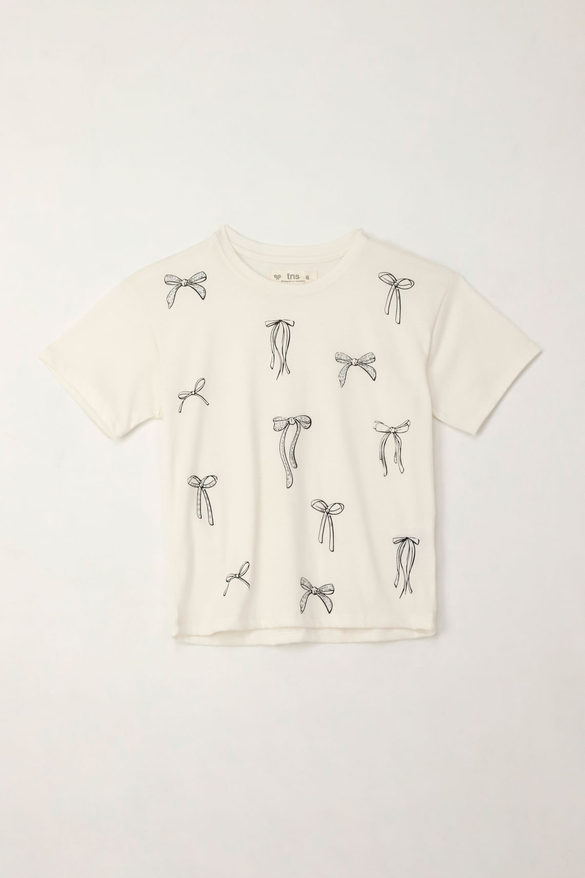 Camiseta básica estampada con apliques crudo para niña