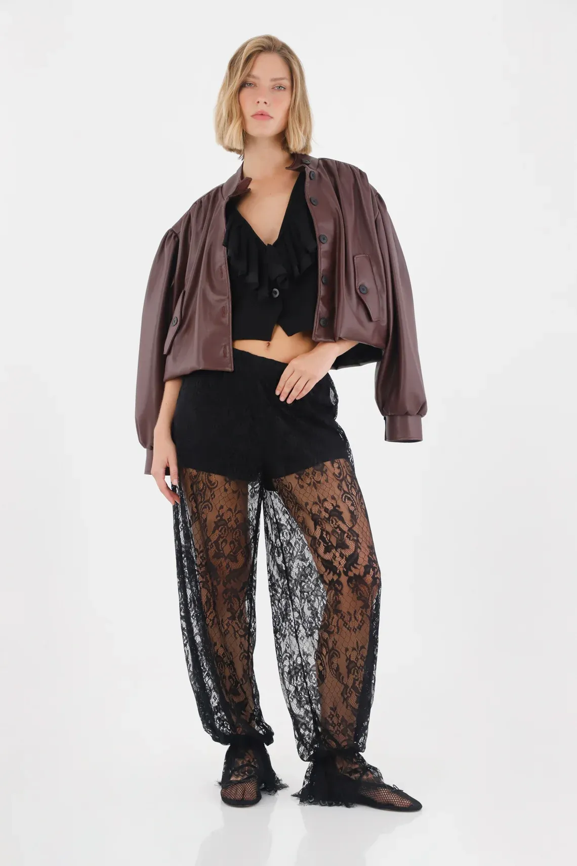 Pantalón en tela blonda negro para mujer