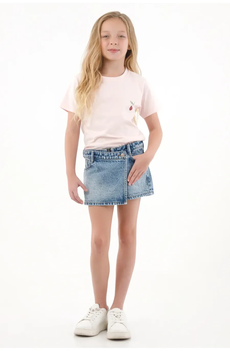 Falda corta en denim tono medio azul para niña