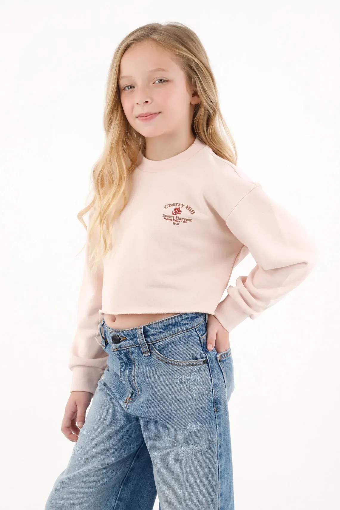 Buzo crop silueta Boxy rosado para niña