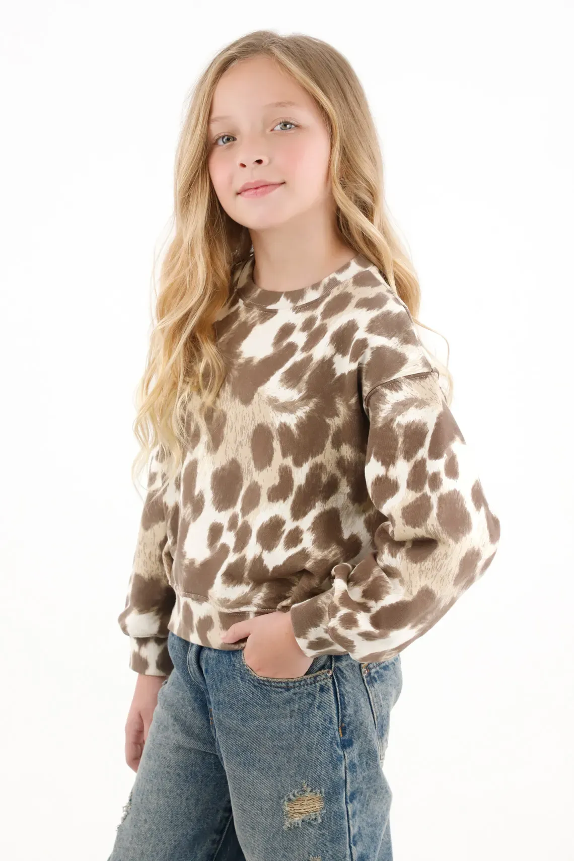 Buzo cerrado con diseño animal print para niña
