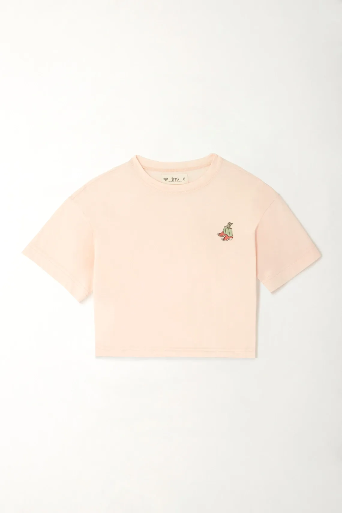 Camiseta boxy con bordado en punto corazón rosada para niña