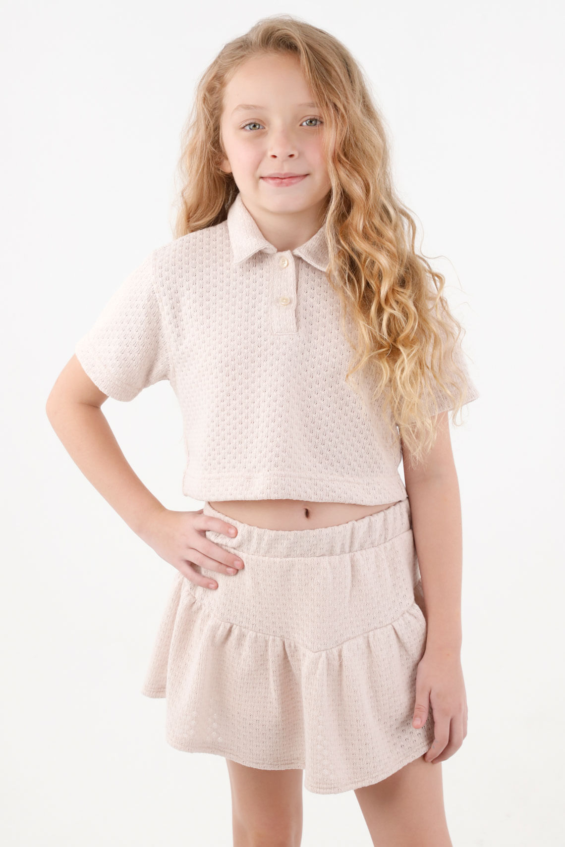 Camiseta tipo polo rosada para niña