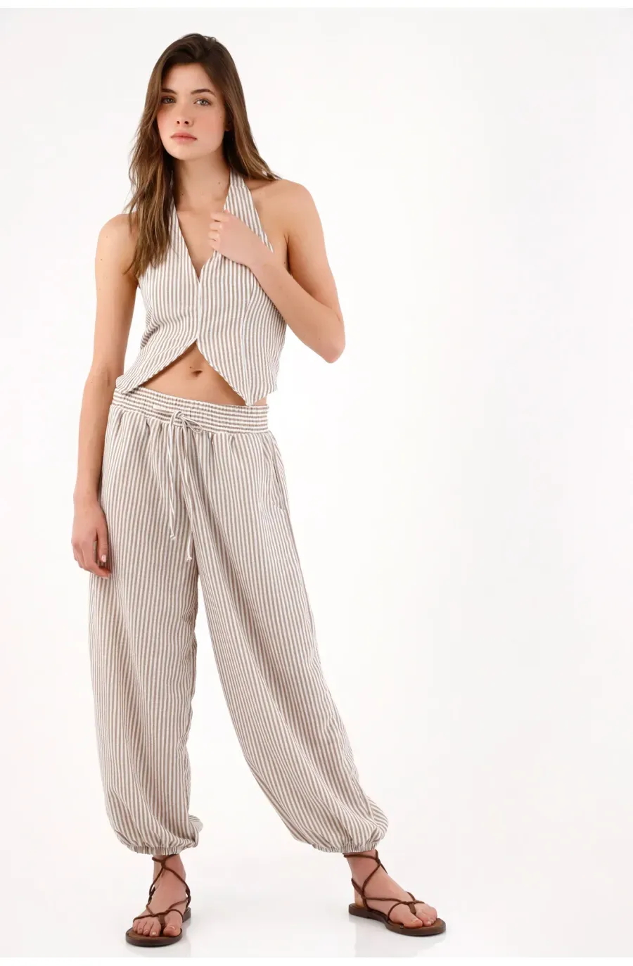Pantalón jogger relaxed con cintura smock en poliéster beige rayado para mujer