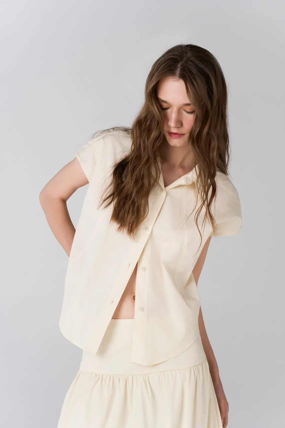 Camisa holgada con manga sisa en algodón marfil para mujer