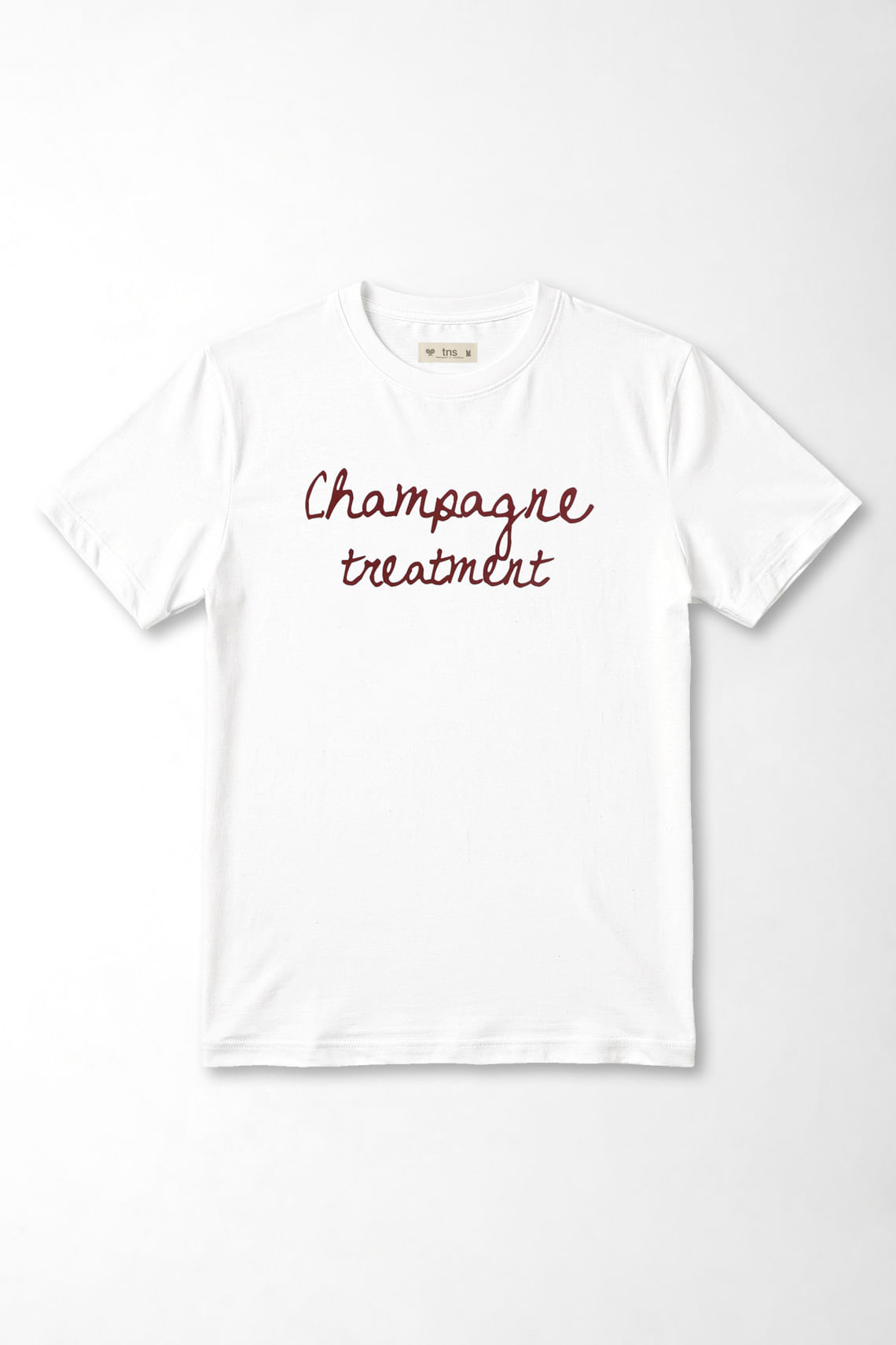 Camiseta corte recto con frase Champagne treatment en algodón blanco para mujer