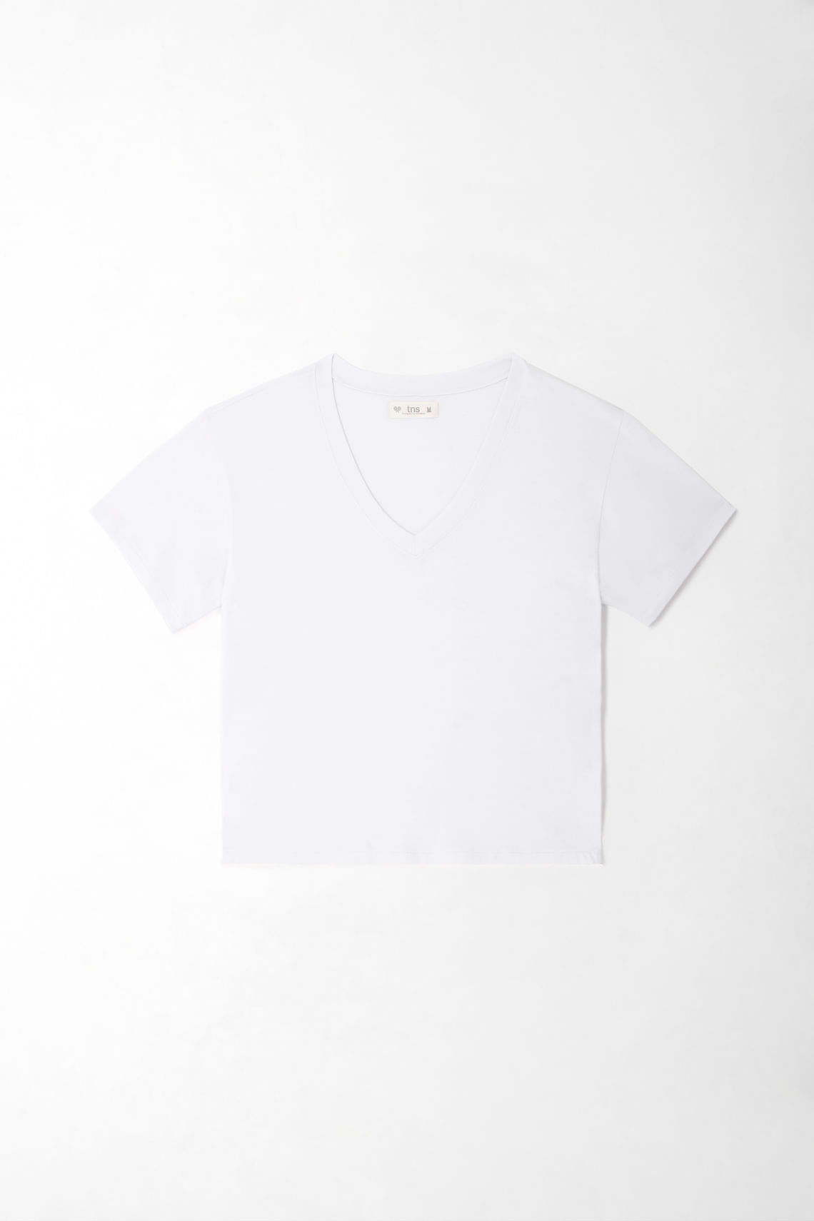 Camiseta para mujer de algodón blanca de fit relajado con escote en V