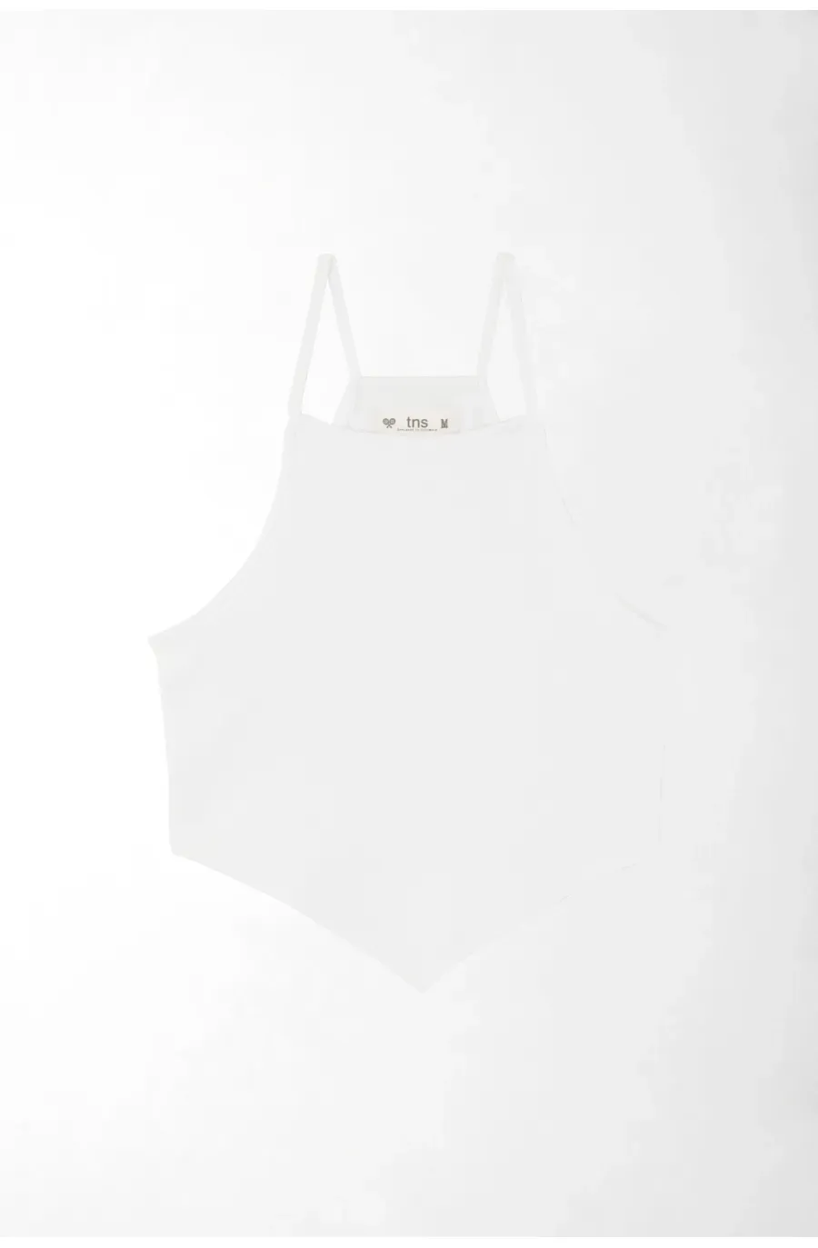 Top ajustado con bajo pañuelo en algodón blanco para mujer